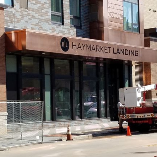 Exterior business signage for Haymarket Landing