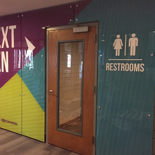 Next gen restrooms colorful design with glass door 