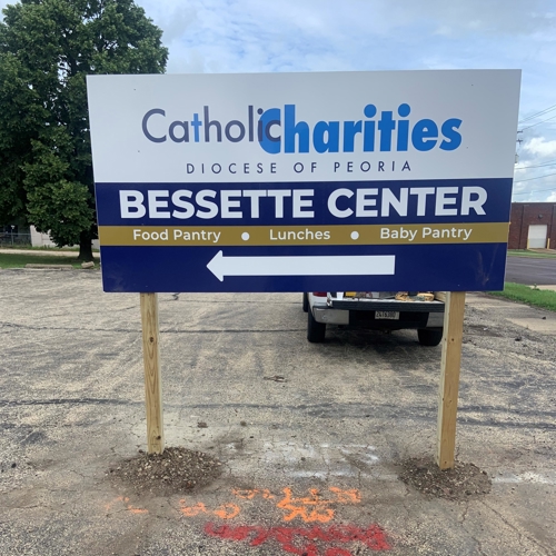 Wayfinding sign for Catholic Charities