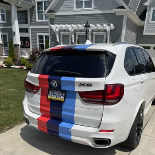 Back of white car with design