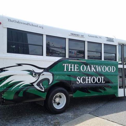 School service with custom vehicle wrap