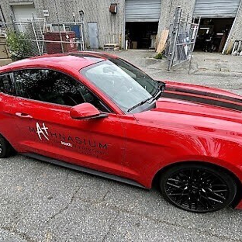 Red mustang with custom car wrap