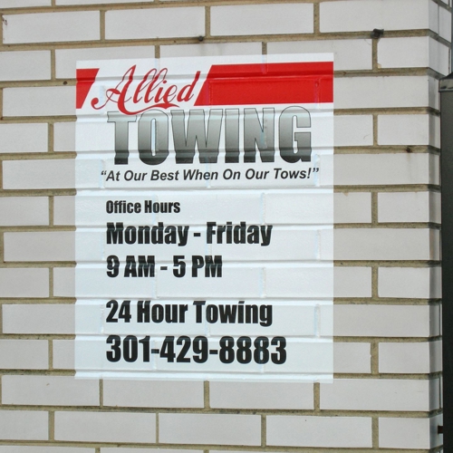 Vinyl On Brick Wall Business Hours