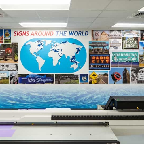 FASTSIGNS Production back room with printer