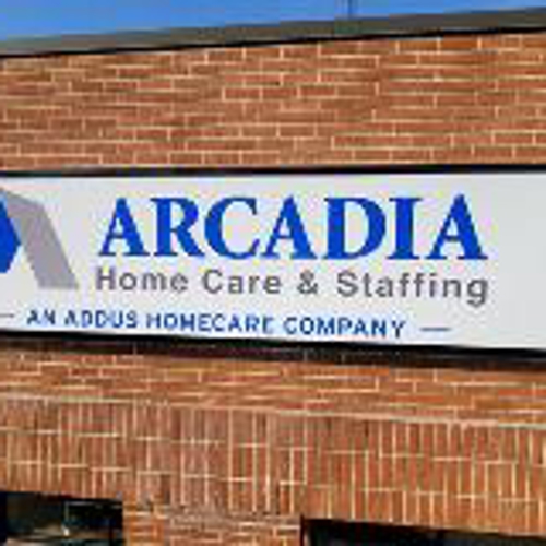 Arcadia Home Care & Staffing Signage on the brick wall 