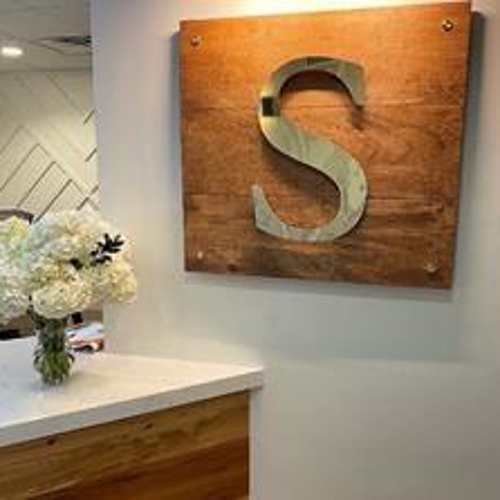 The social logo on the wall