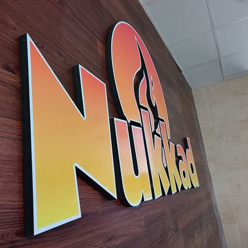 orange and yellow wall lettering