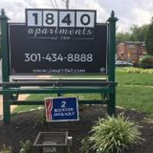 Custom exterior signage on the side of the road