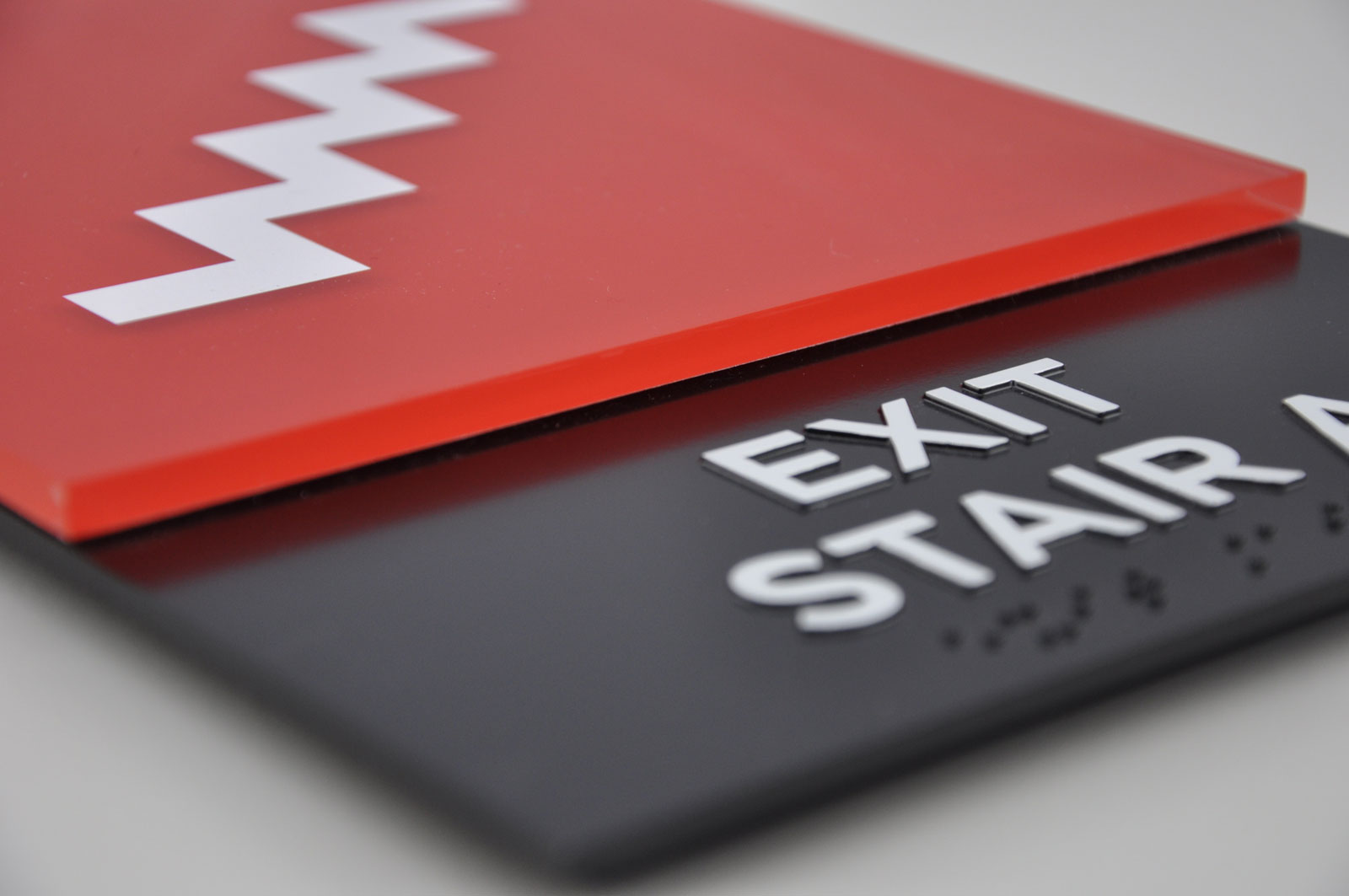 Custom “Exit Stair” signage installed by FASTSIGNS in Olympia, WA