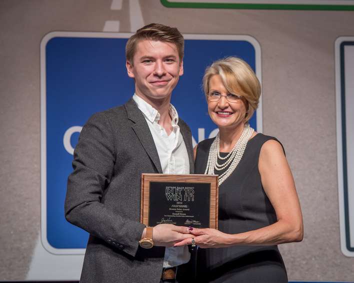 Russell Romo accepting award