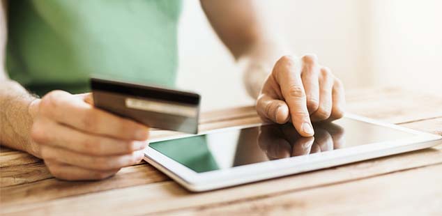 person paying with a card
