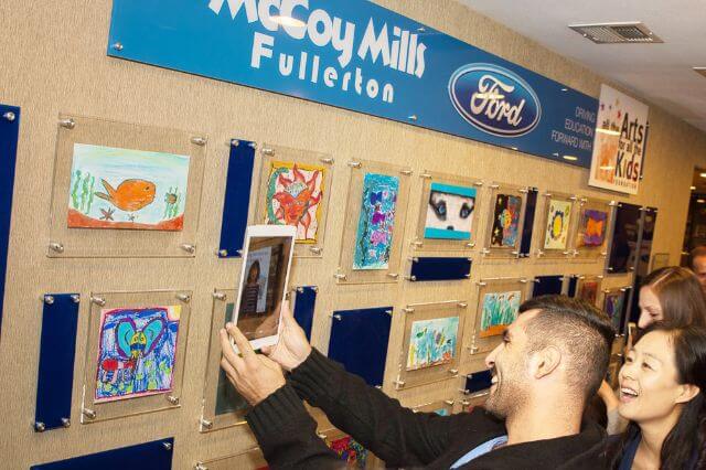 McCoy Milk Fulleton custom wall decals with people viewing