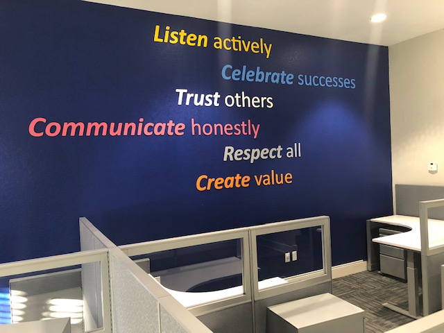 large vinyl sign on wall