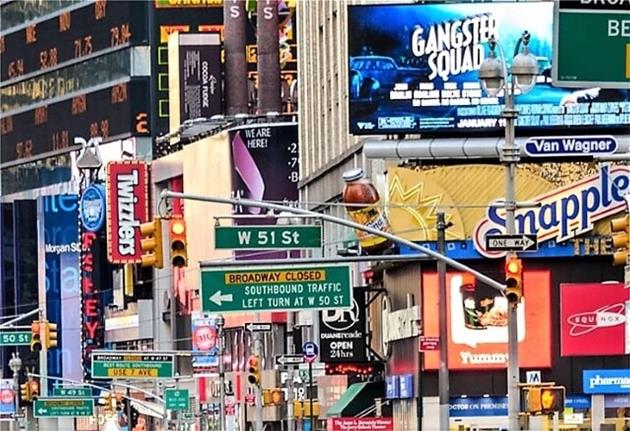 a busy street with lots of signage