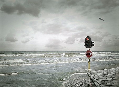a street light in the middle of a flood