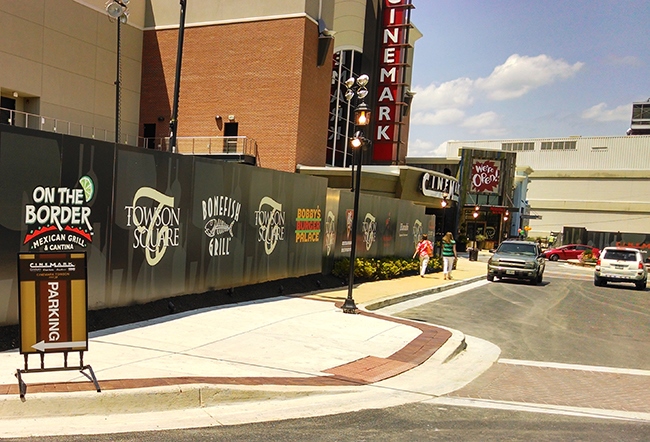 wall graphics show stores in a shopping complex