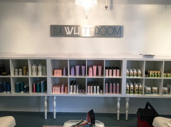 a wall sign for the white room