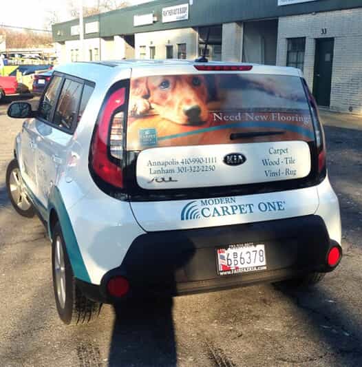 a car has carpet one graphics on it