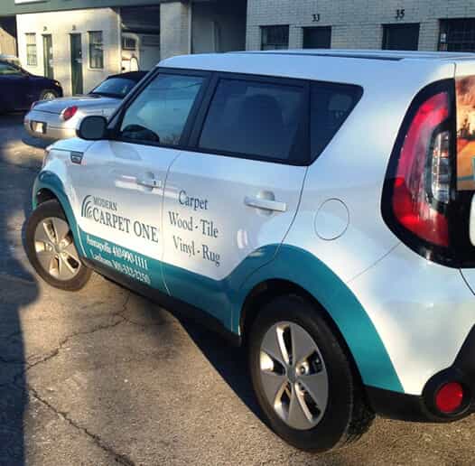 a car has carpet one graphics on it