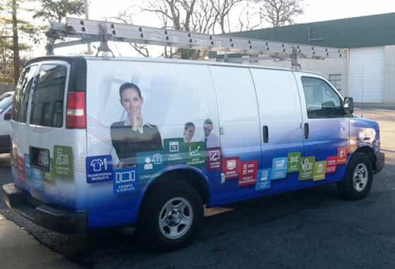 a van with fastgsigns graphics