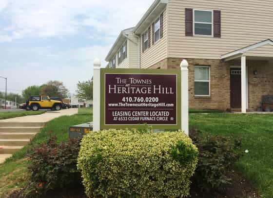 a monument sign for a leasing center