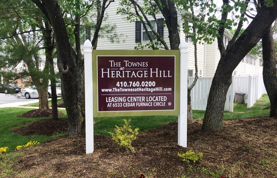 a monument sign for a leasing center