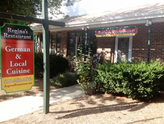 Outdoor signage at Regina's Restaurant