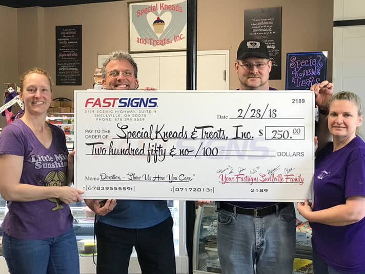 Fastsigns donation check 